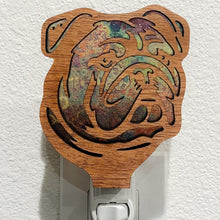 Load image into Gallery viewer, A laser-cut wooden night light in the shape of a dog&#39;s head, shown against a white wall