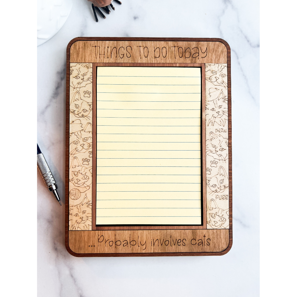 A wooden sticky note holder with a pet dog and cat theme, featuring a 4x6 inch notepad.
