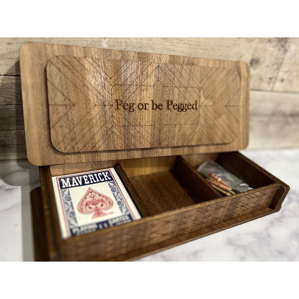 Cribbage board with personalization shown on the inside lid