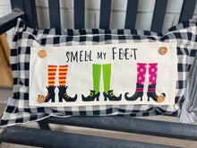Load image into Gallery viewer, Decorative pillow with witch feet design and &#39;Smell my Feet&#39; text on a striped background.