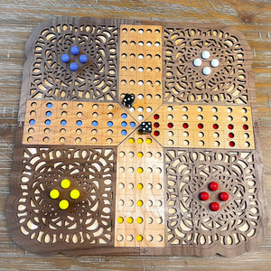 Wooden game board with colorful marbles on a wooden surface
