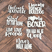 Load image into Gallery viewer, White cutout word phrases shown on a brown table top