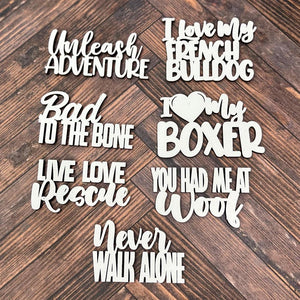 White cutout word phrases shown on a brown table top