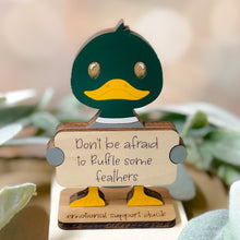 Load image into Gallery viewer, Wooden duck figurine with a motivational message on a blurred natural background