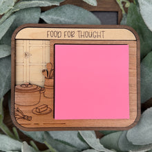 Load image into Gallery viewer, Wooden notepad with pink surface and decorative illustrations on a leafy background
