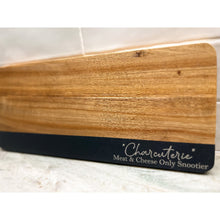 Load image into Gallery viewer, Wooden charcuterie board with engraved phrase “Charcuterie Meat &amp; Cheese Only Snootier,” displayed on a marble countertop.