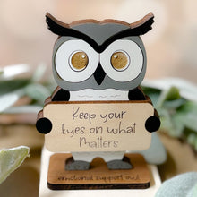 Load image into Gallery viewer, Wooden owl figurine with a motivational message on a blurred natural background