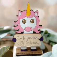 Load image into Gallery viewer, Unicorn figurine with a motivational quote on a wooden base, surrounded by greenery.